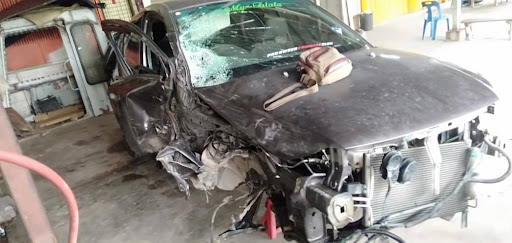 Tan Auto Service Welder & Painting