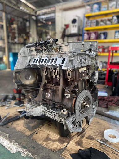 BENGKEL AUTOMOTIF DAN SERVICE AIRCOND KERETA