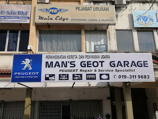 MAN'S GEOT GARAGE